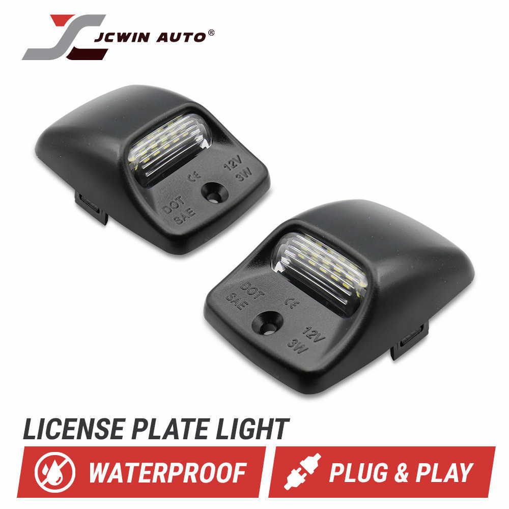 Two black license plate light covers shown on a white background with the brand name JCWIN AUTO at the top and feature badges at the bottom indicating waterproof and plug-and-play.