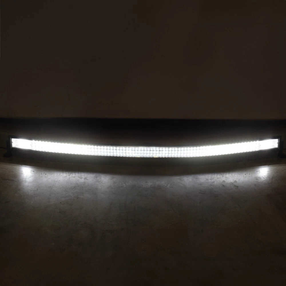 A curved LED light bar mounted on a dark surface, glowing brightly against a dark background.