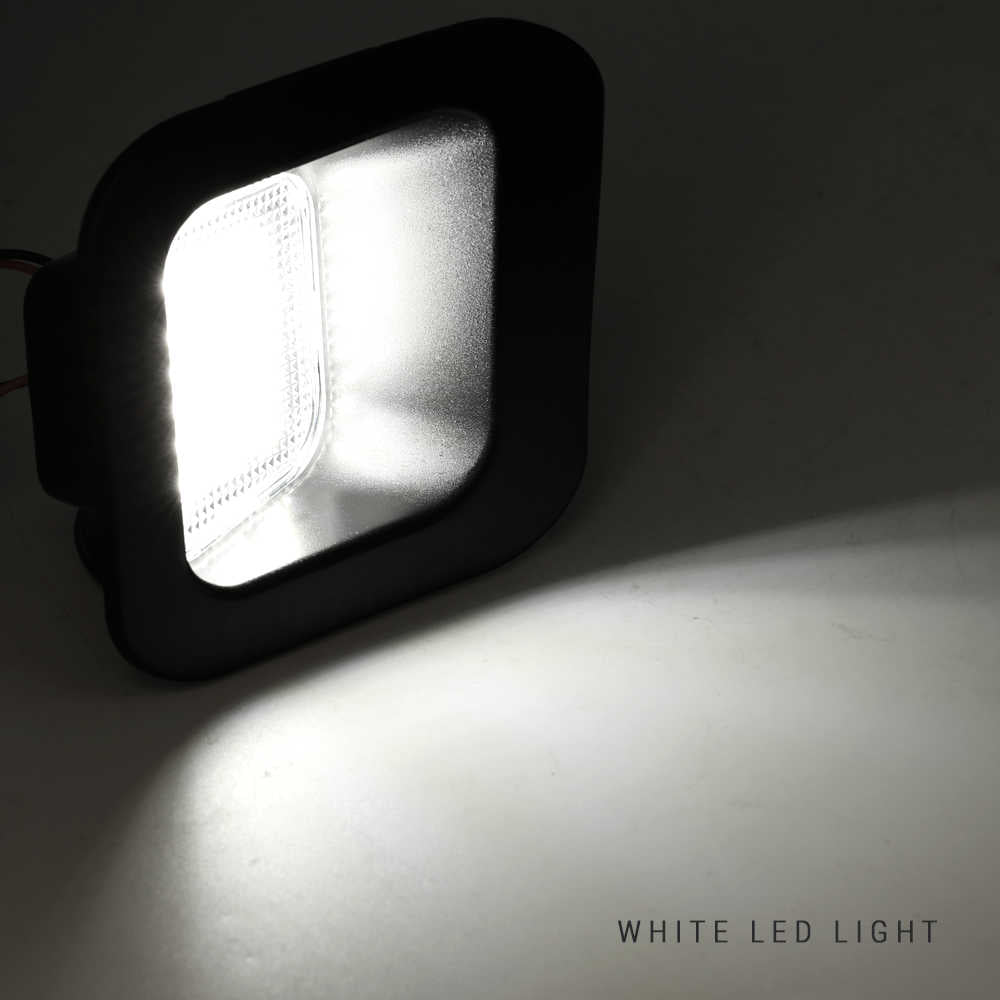 A square black LED light fixture casting a bright white light onto a plain surface, with the text 'WHITE LED LIGHT' in the bottom right corner.