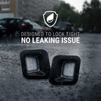 Two black square LED light units shown on wet pavement in the rain, with overlaid text reading 'DESIGNED TO LOCK TIGHT' and 'NO LEAKING ISSUE' plus a shield icon.
