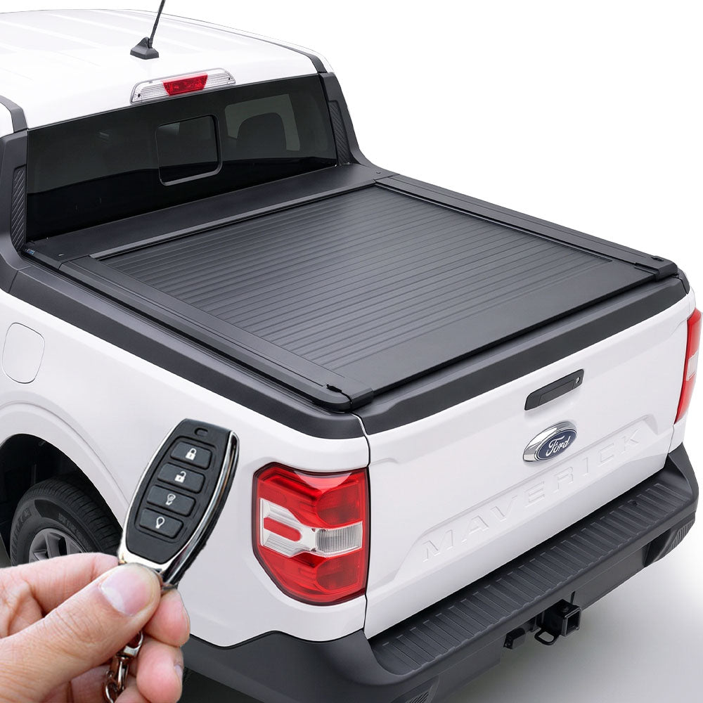 White Ford Maverick pickup truck with a retractable bed cover and remote key fob.