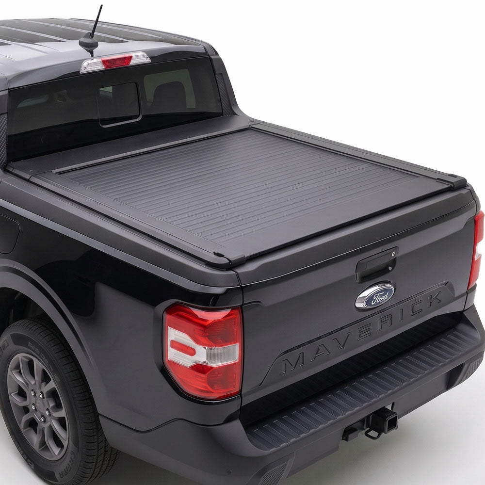 A truck bed cover installed on the bed of a black Ford Maverick pickup truck.