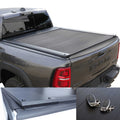 Gray RAM truck with a tonneau cover and remote controls on a white background
