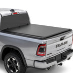 Silver Ram truck with a soft roll up tonneau cover