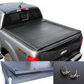 Gray Ranger truck with a tonneau cover and key fobs on a white background