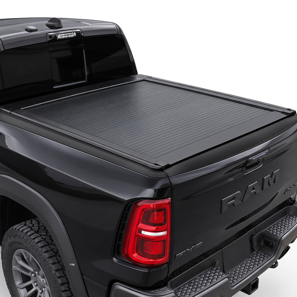 A black Ram pickup truck with a retractable bed cover