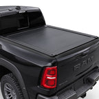 A black Ram pickup truck with a retractable bed cover