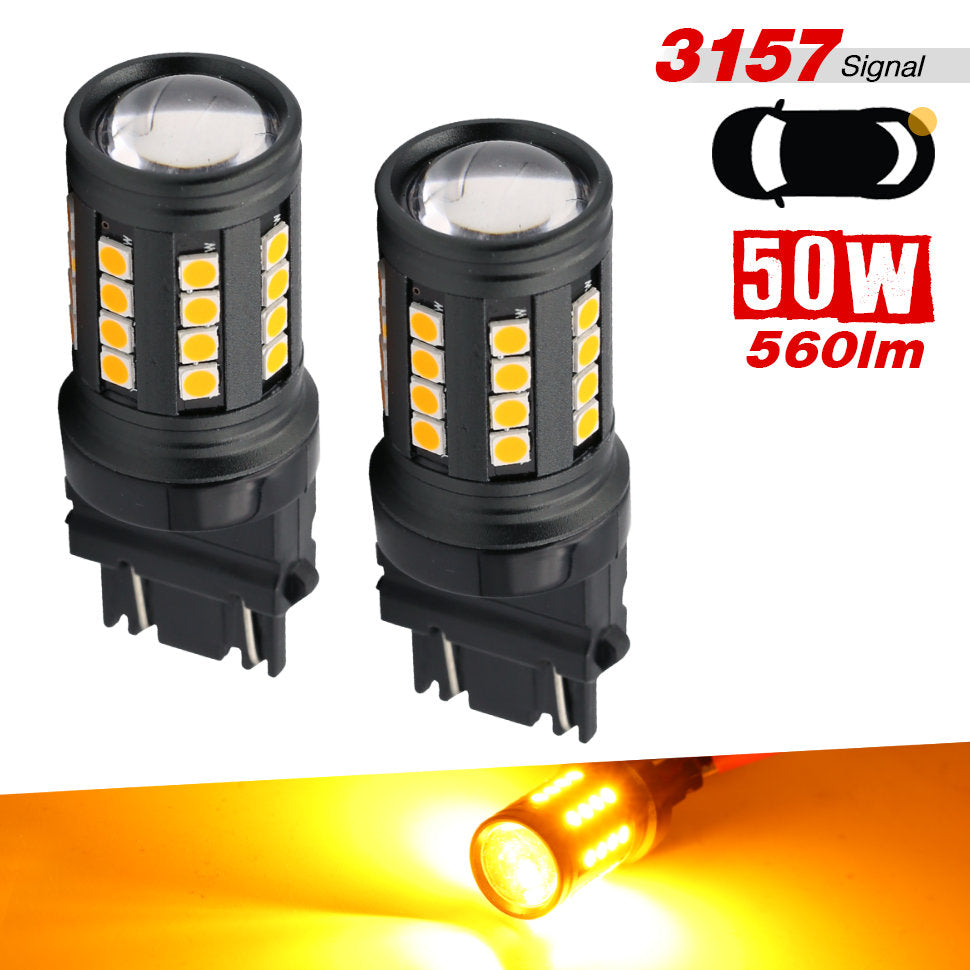 Two black 3157 signal LED car light bulbs shown on a white background, with text indicating 50W, 560lm, and amber/yellow light output, plus a small illuminated bulb photo at the bottom.