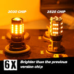 Two automotive LED light bulbs shown side by side on a dark surface, labeled '3030 CHIP' and '3528 CHIP', with text at the bottom reading '6X Brighter than the previous version chip'. The bulbs are illuminated in a warm yellow-orange glow.
