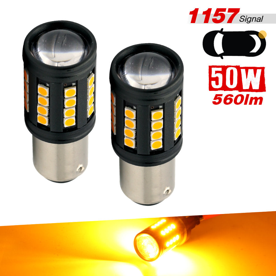 Two black and silver LED car signal bulbs with yellow light-emitting diodes, shown on a white background with red text indicating 1157 signal, 50W, and 560lm, plus an inset showing the illuminated yellow light.