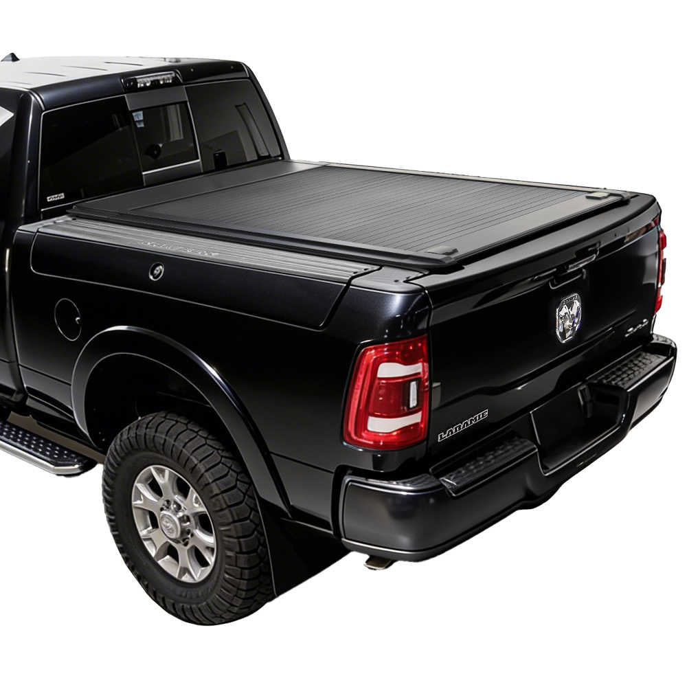 Black pickup truck with a tonneau cover on a white background