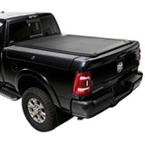 Black pickup truck with a tonneau cover on a white background