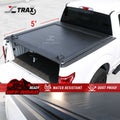 5ft Truck bed cover with JC Trax branding on a white truck