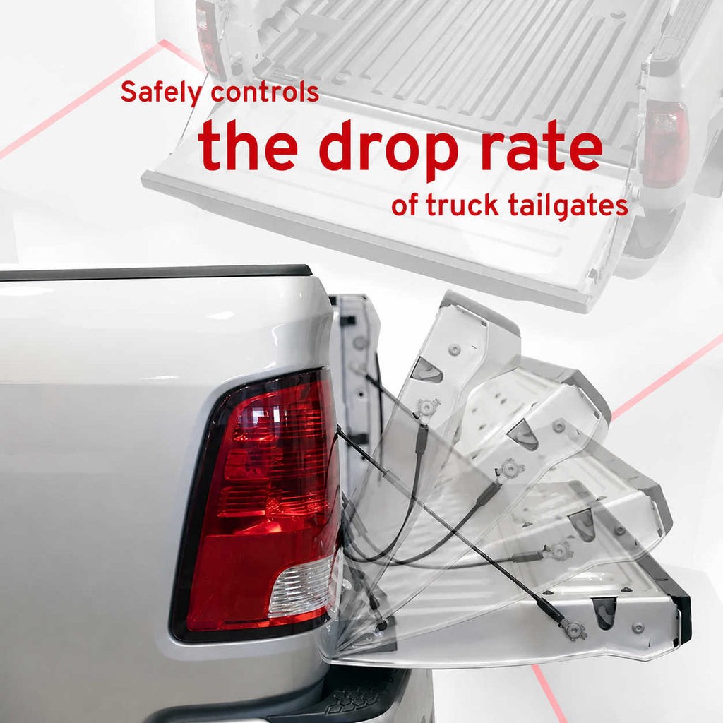 A close-up of the rear left side of a white pickup truck showing a deployed clear plastic tailgate safety control with attached black cables. Red text reads 'Safely controls the drop rate of truck tailgate' over a white background with a faded inset of the tailgate.