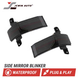 Two car side mirror blinkers with JCWin Auto branding on a white background.