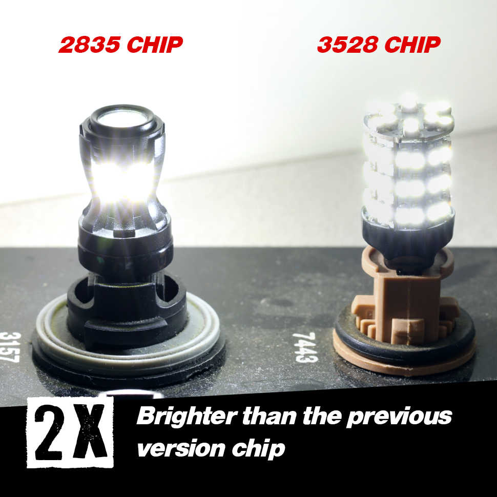 Two LED light bulbs with '2835 CHIP' and '3528 CHIP' labels on a dark surface.
